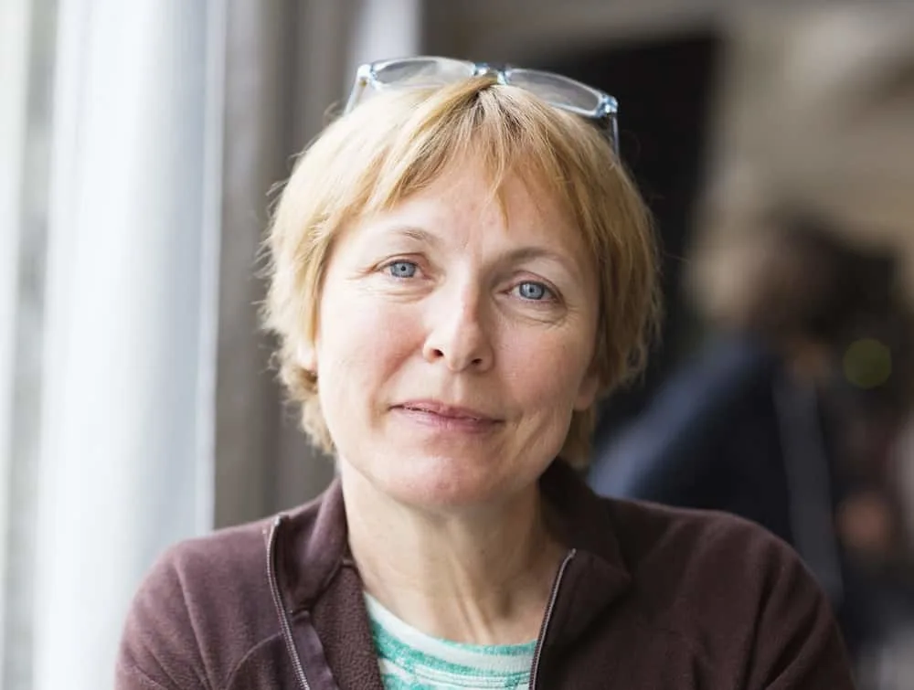 Older Woman with Layered Blonde Hair