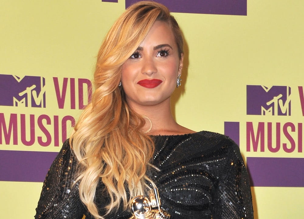 Blonde haired Mexican singer - Demi Lovato