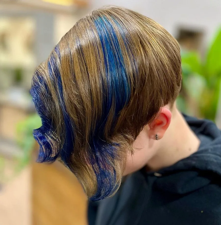 Blue chunky highlights on short brown hair