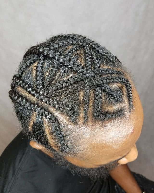 black guy with braid hairstyle