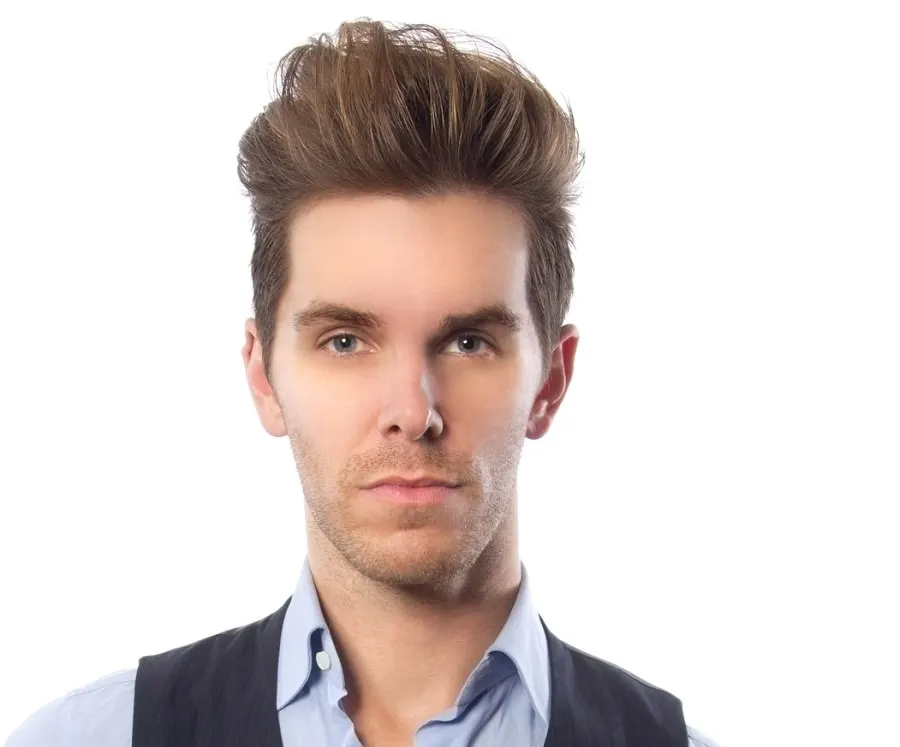 British man with pompadour hairstyle