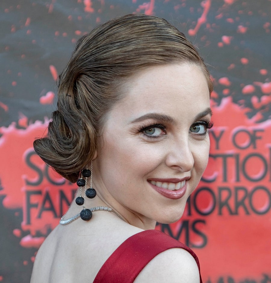 Brittany Curran With Brown Hair And Blue Eyes