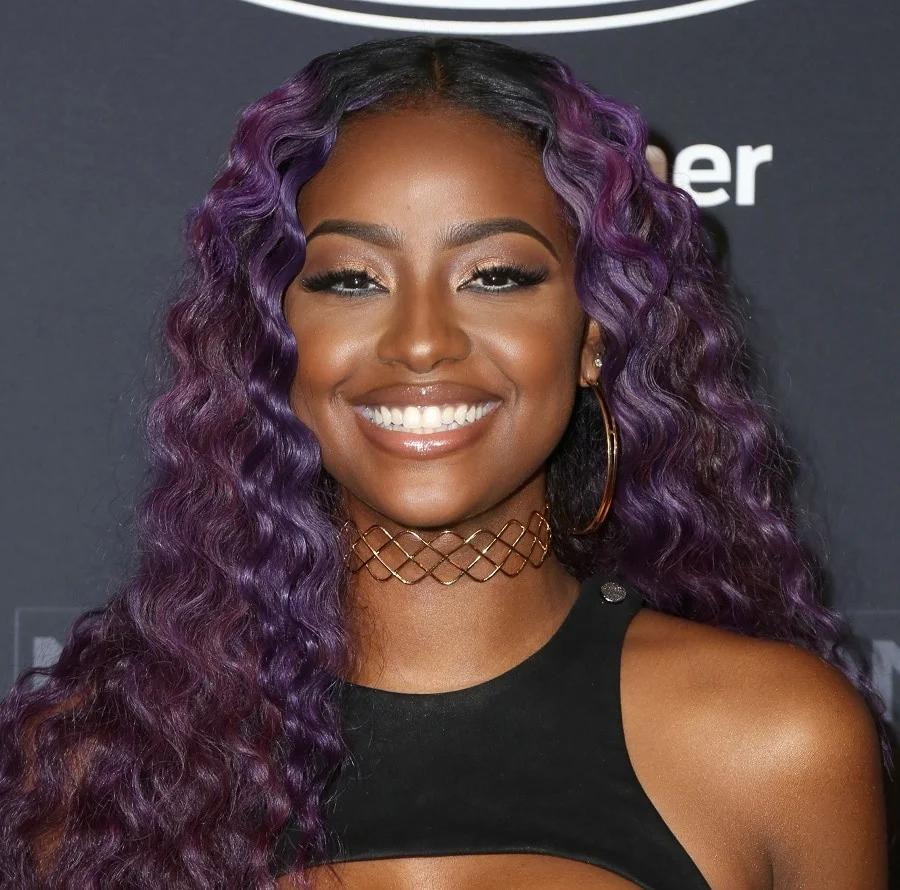 Celebrity Justine Skye with Curly Purple Hair