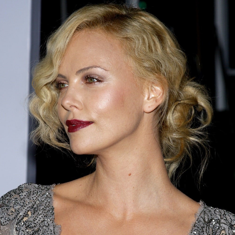 Charlize Theron's Wavy Updo Hairstyle