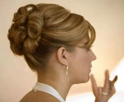 Chic High Coiled Bun for mother of the bride hairstyles