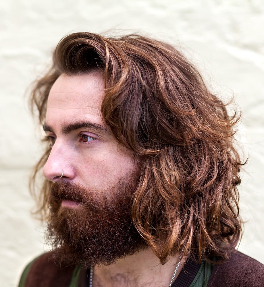 Chin-Length Feathered Hairstyle for Men