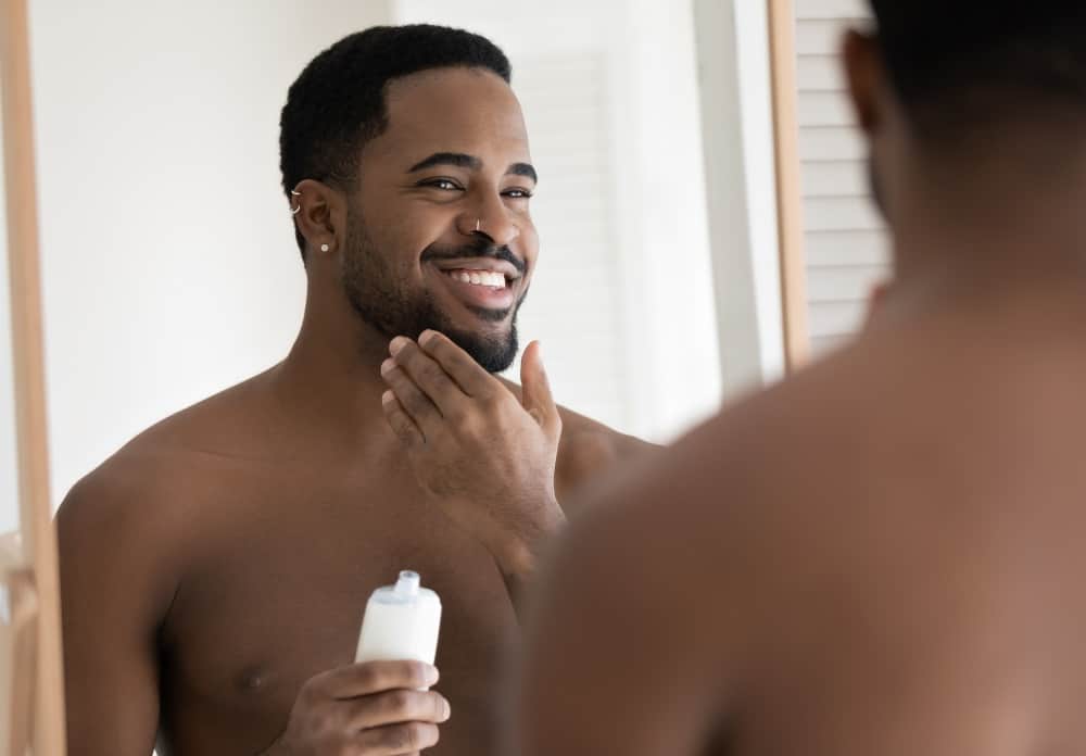 Cleaning and Moisturizing Black Men's Beard Regularly