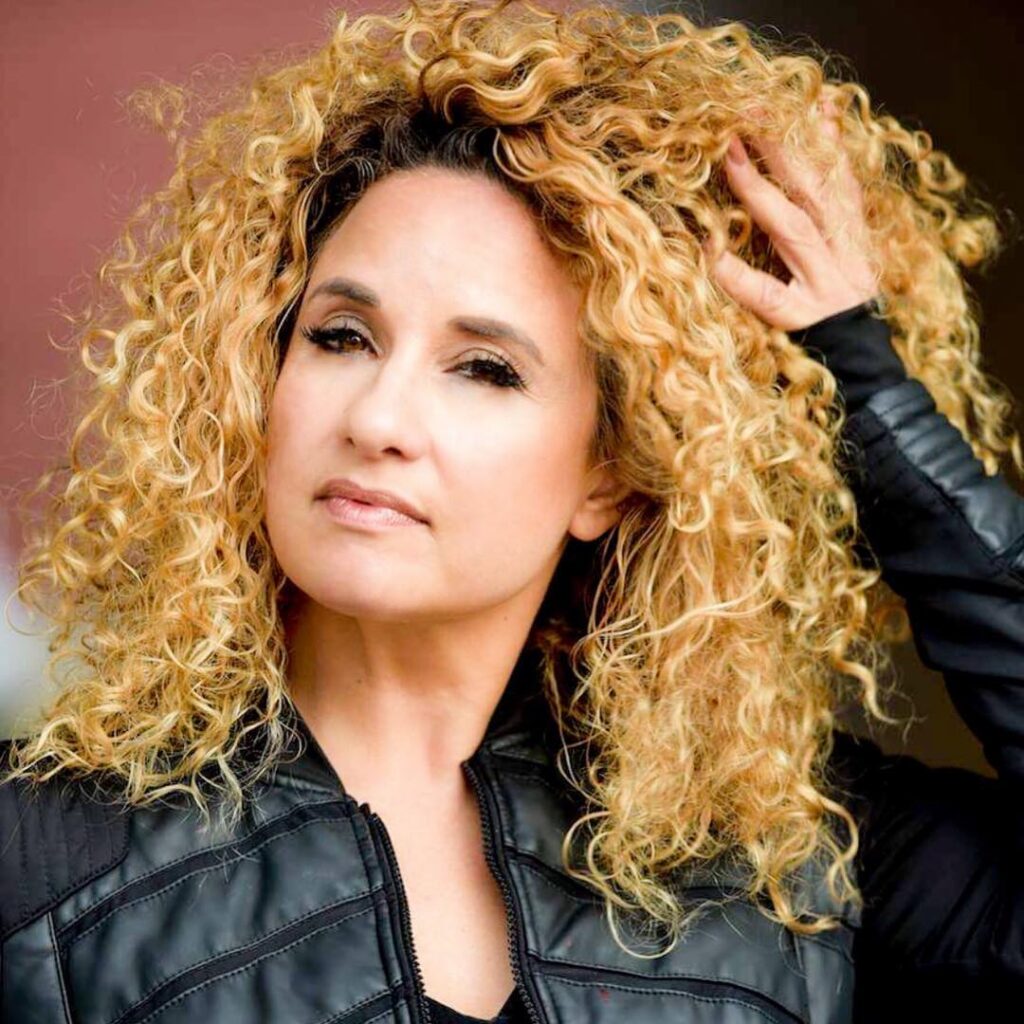 Comedian Maija DiGiorgio With Curly Hair