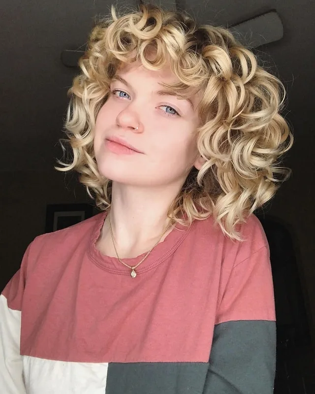 Curly Blonde Hair with Blue Eyes