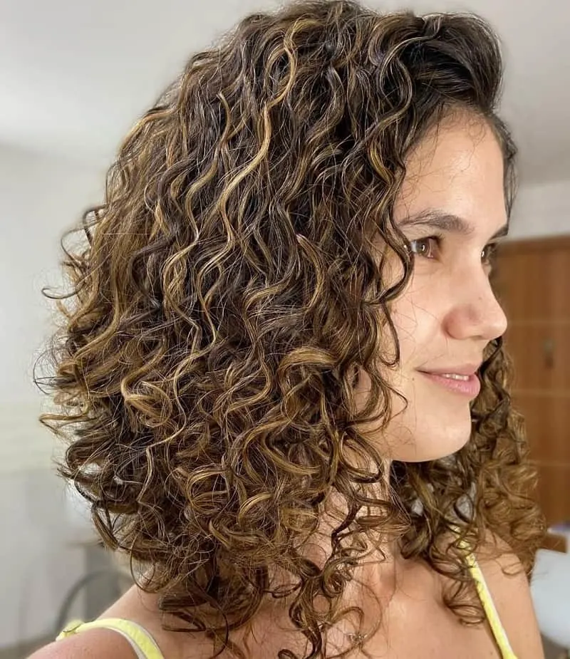 Curly Inverted Caramel Brown Haircut
