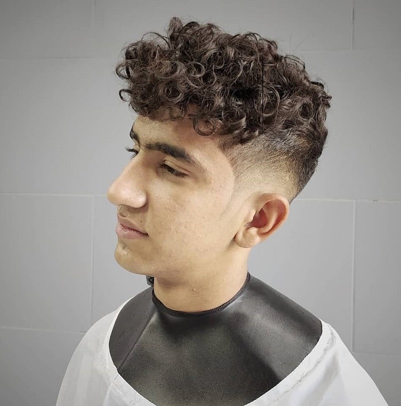 Curly Top with Low Fade for Teenage Guys