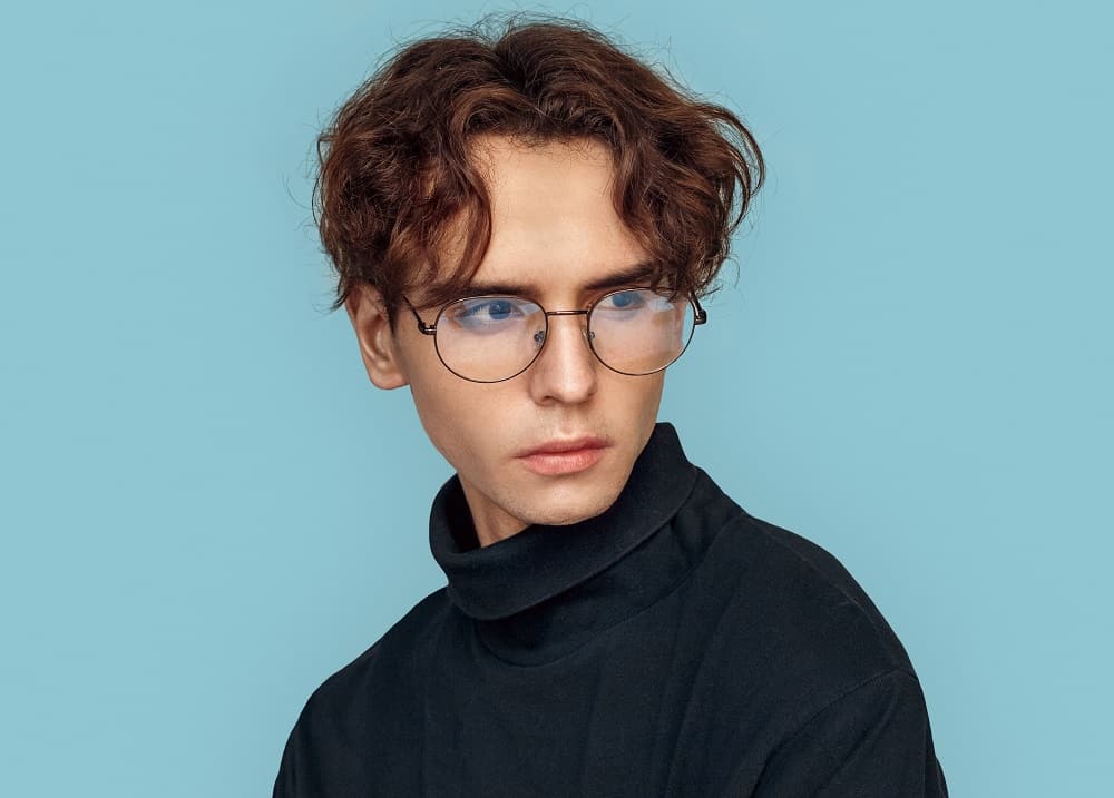 Curtain hairstyle for men with glasses