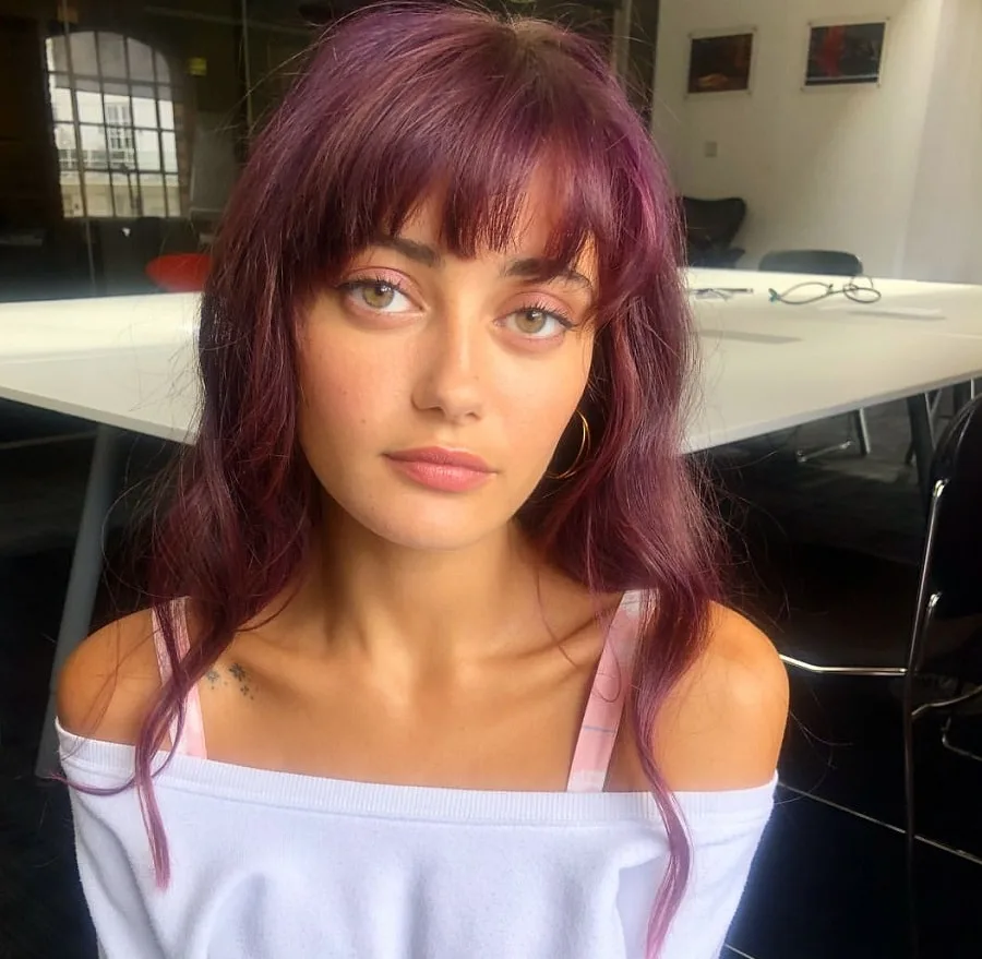Ella Purnel with purple hair