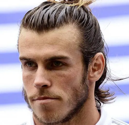 Gareth Bale shows off incredible long hair as Real Madrid outcast undoes  his man bun in Wales training  The Sun