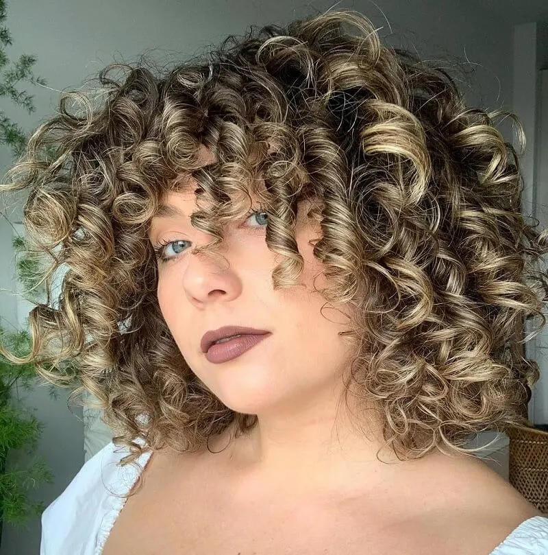 Highlighted Dishwater Blonde Curls