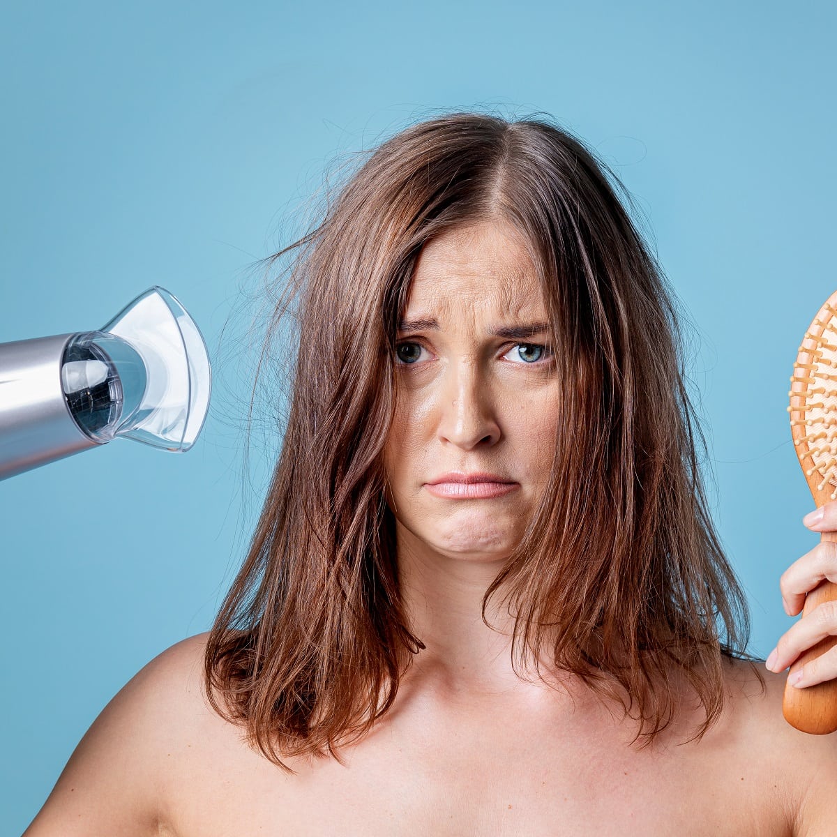 how-to-blow-dry-hair-without-creating-frizz-according-to-hairstylist