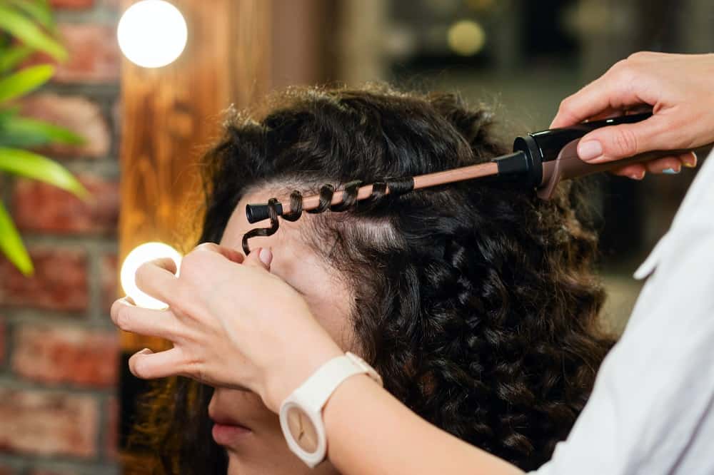 How to Use A Curling Wand for Beautiful Curls, According To Hair Expert