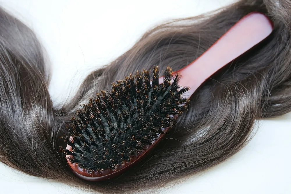 How to make hair stay in place - use a boar bristle brush