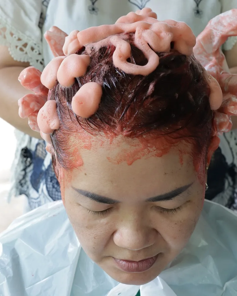 Using Color-Depositing Shampoo to Refresh Faded Color