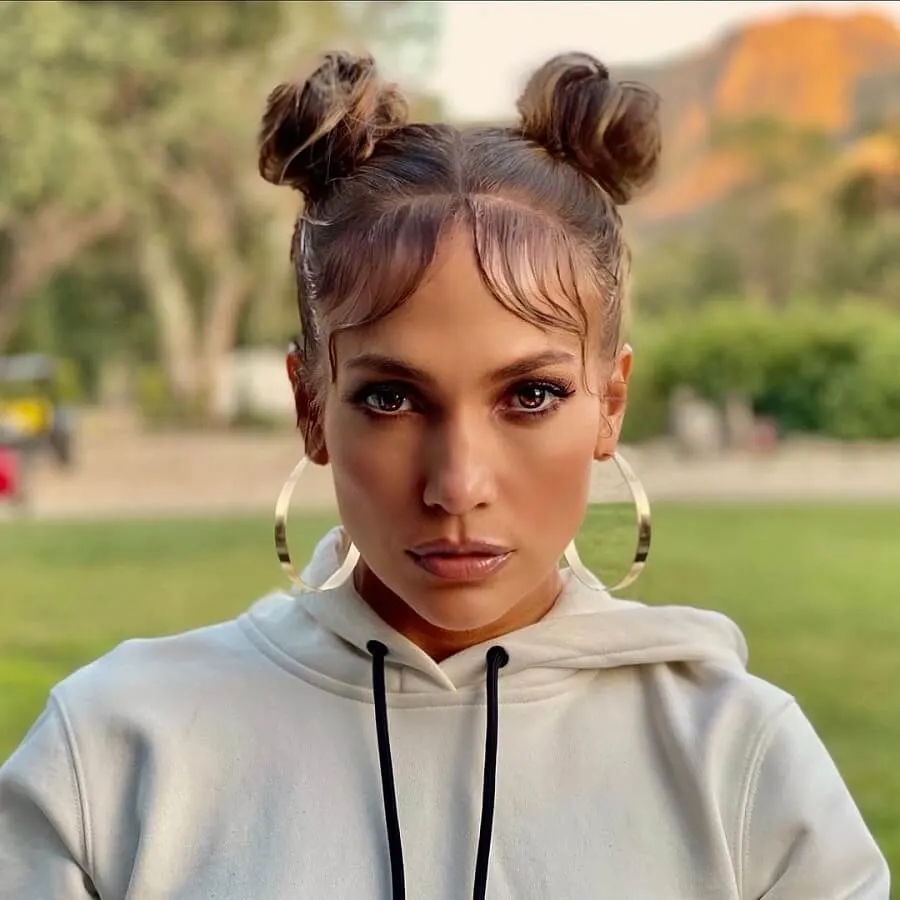 Jennifer Lopez with space buns