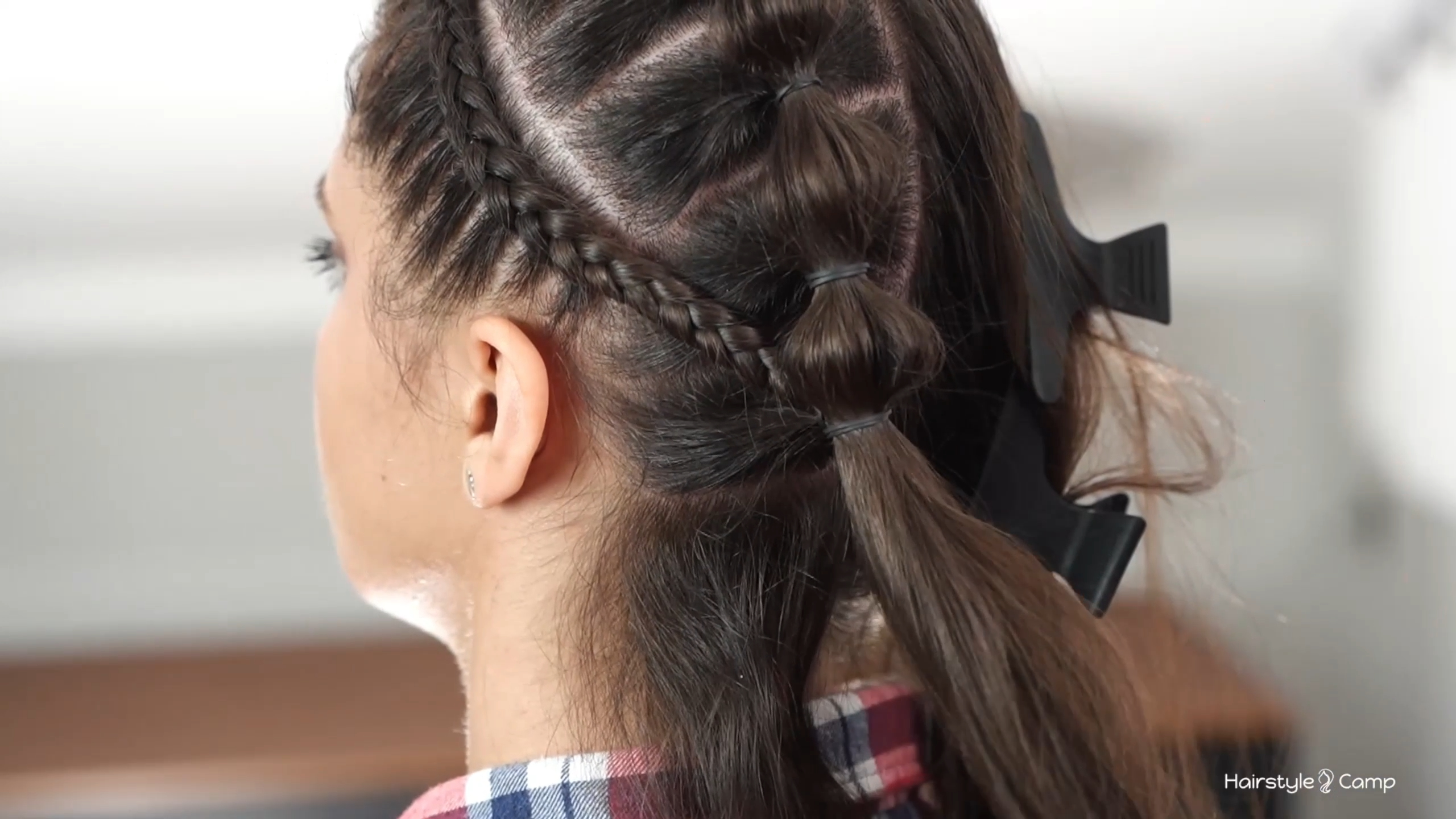 The tail of lace braid blended into bubble braid