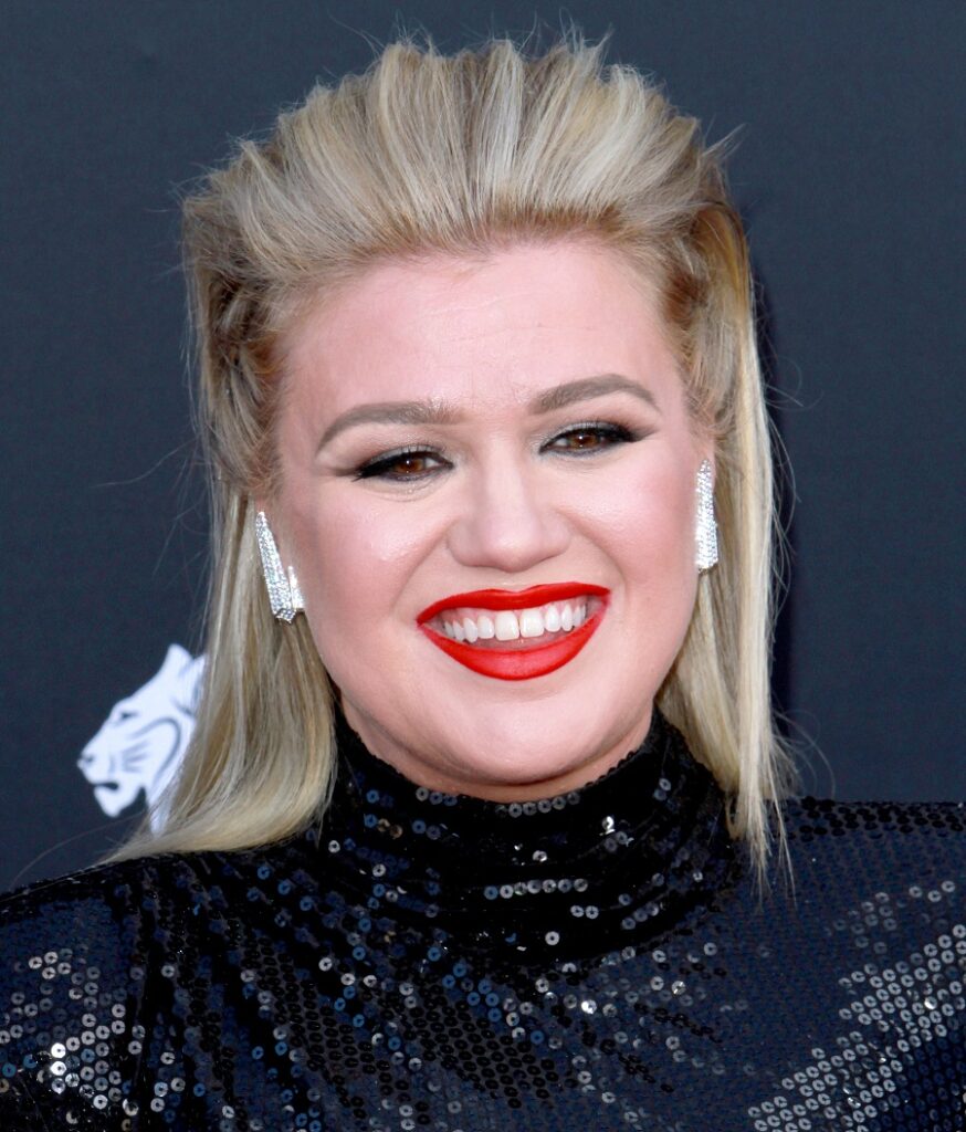 Kelly Clarkson with slick back hairstyle