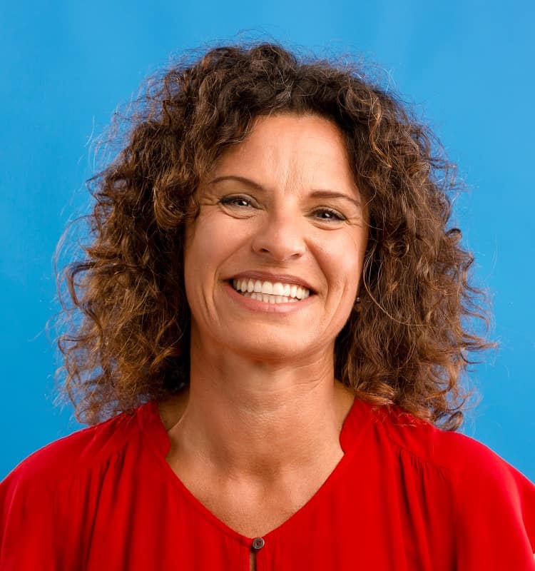 Layered Curly Hairstyle for Women Over 50