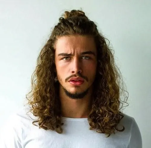 long curly man bun hair
