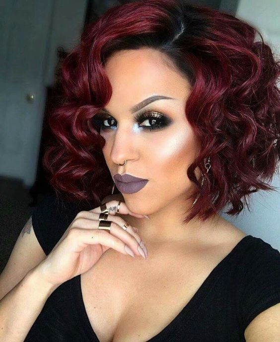 edgy Medium Curly Hairstyle for women 
