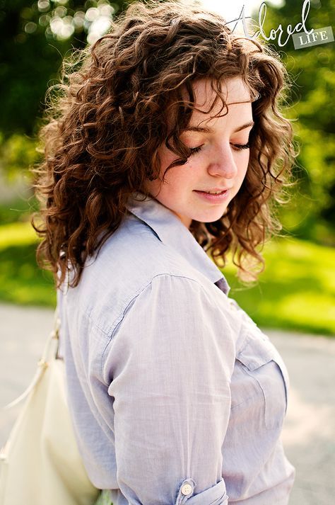  bangs with Medium Curly Hairstyle