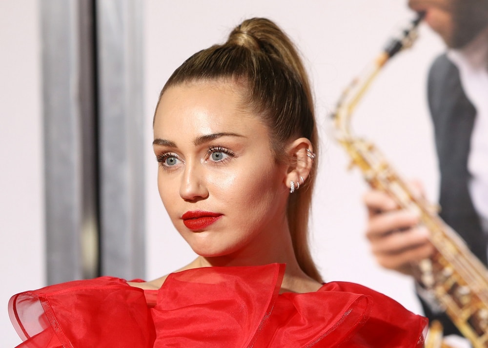 Miley Cyrus with high ponytail