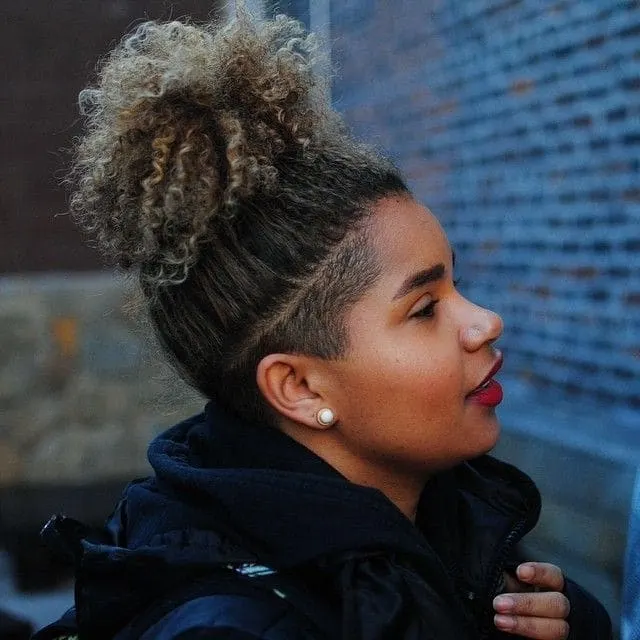 undercut curly nape hairstyle for women 