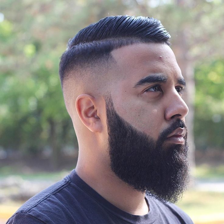 Side Part Pompadour hairstyle with beard