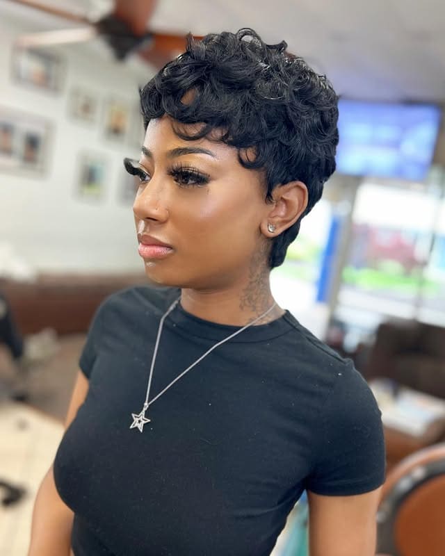 short and voluminous curly black 27 piece hairstyle