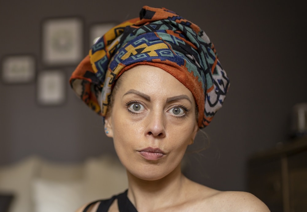 Steps to wrap hair at night - secure with a head wrap