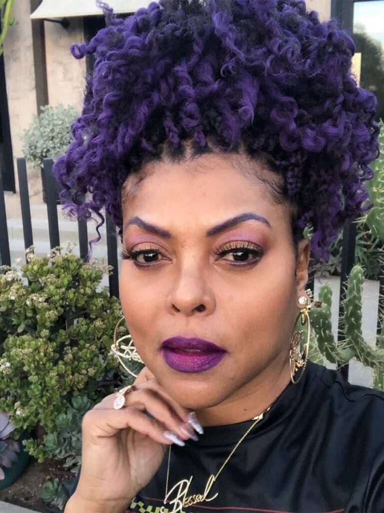 Taraji P. Henson with dark purple curls