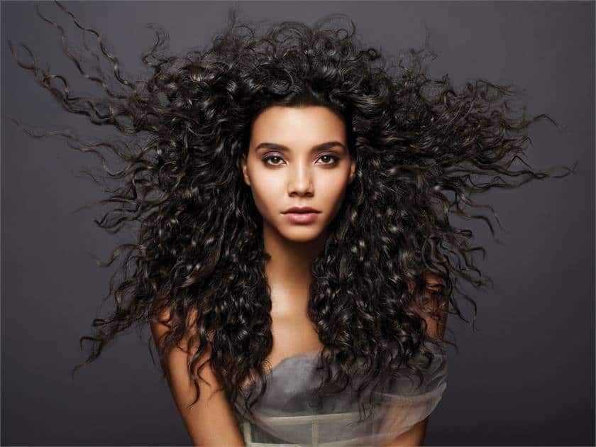 The 11 Best Products For Permed Hair To Keep Your Curls Intact