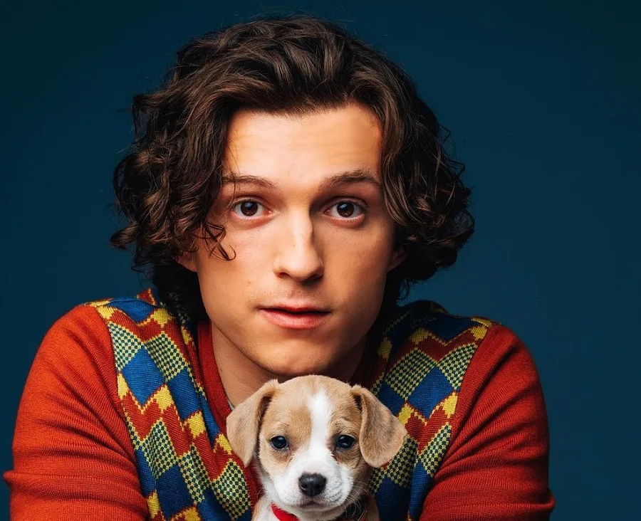 Tom Holland medium length wavy haircut