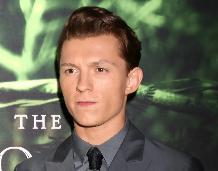 Tom Holland side swept hairstyle