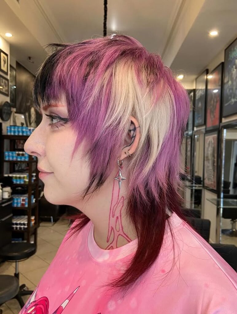 edgy pink and violet scene hair with short, spiky textures