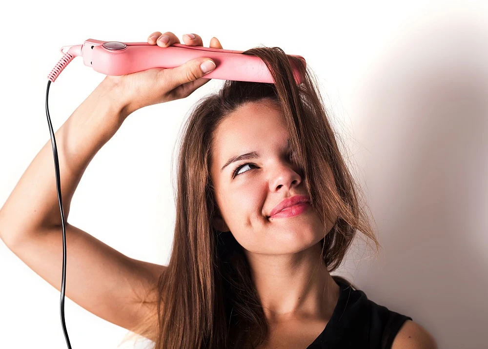 Ways to Get Rid of Cowlick - apply heat