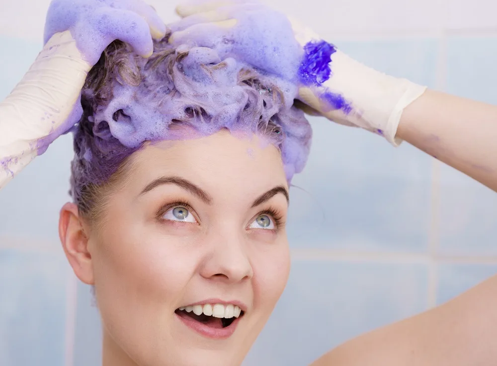 Why does blonde hair turn brown - too much purple shampoo
