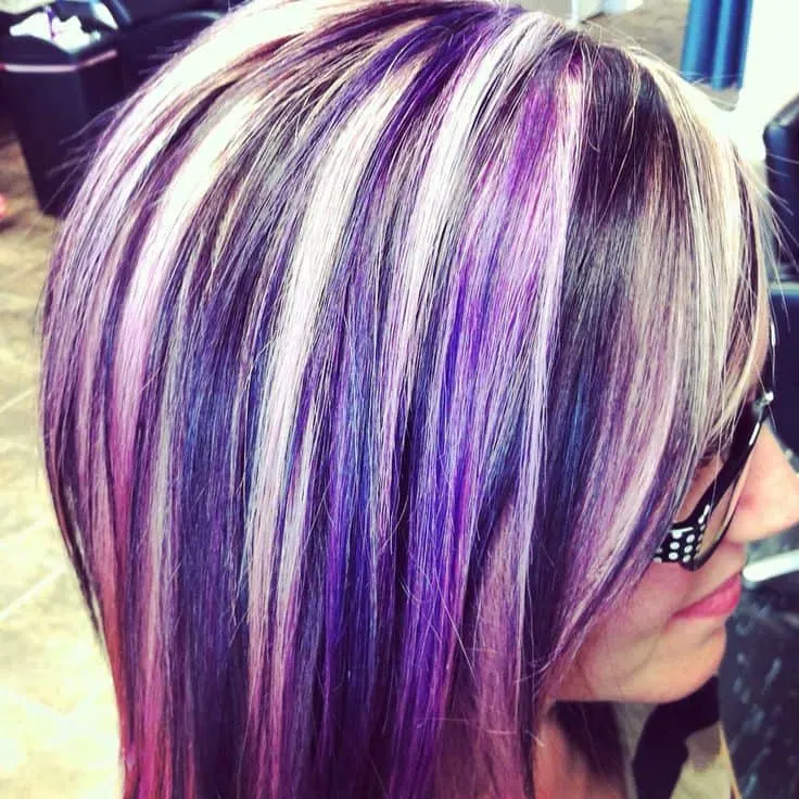 dark brown hair with purple and blonde highlights