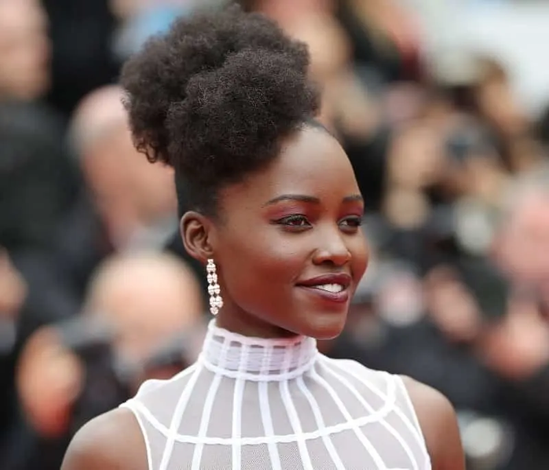 actress Lupita with her natural curly hair