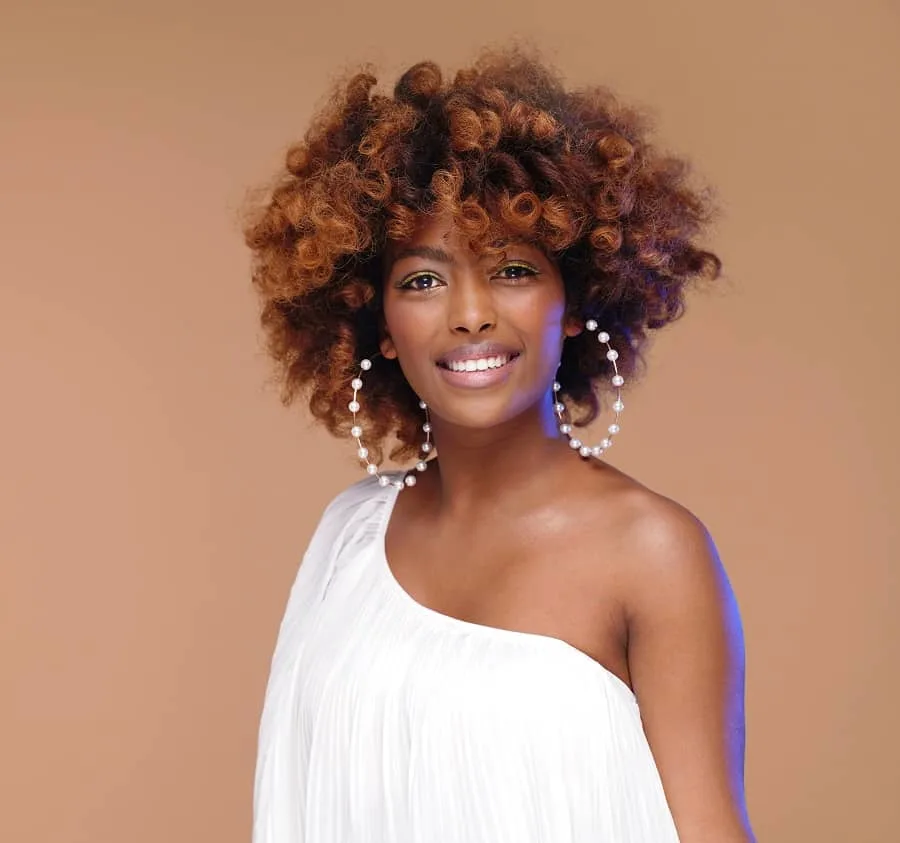 afro hairstyle for one shoulder dress
