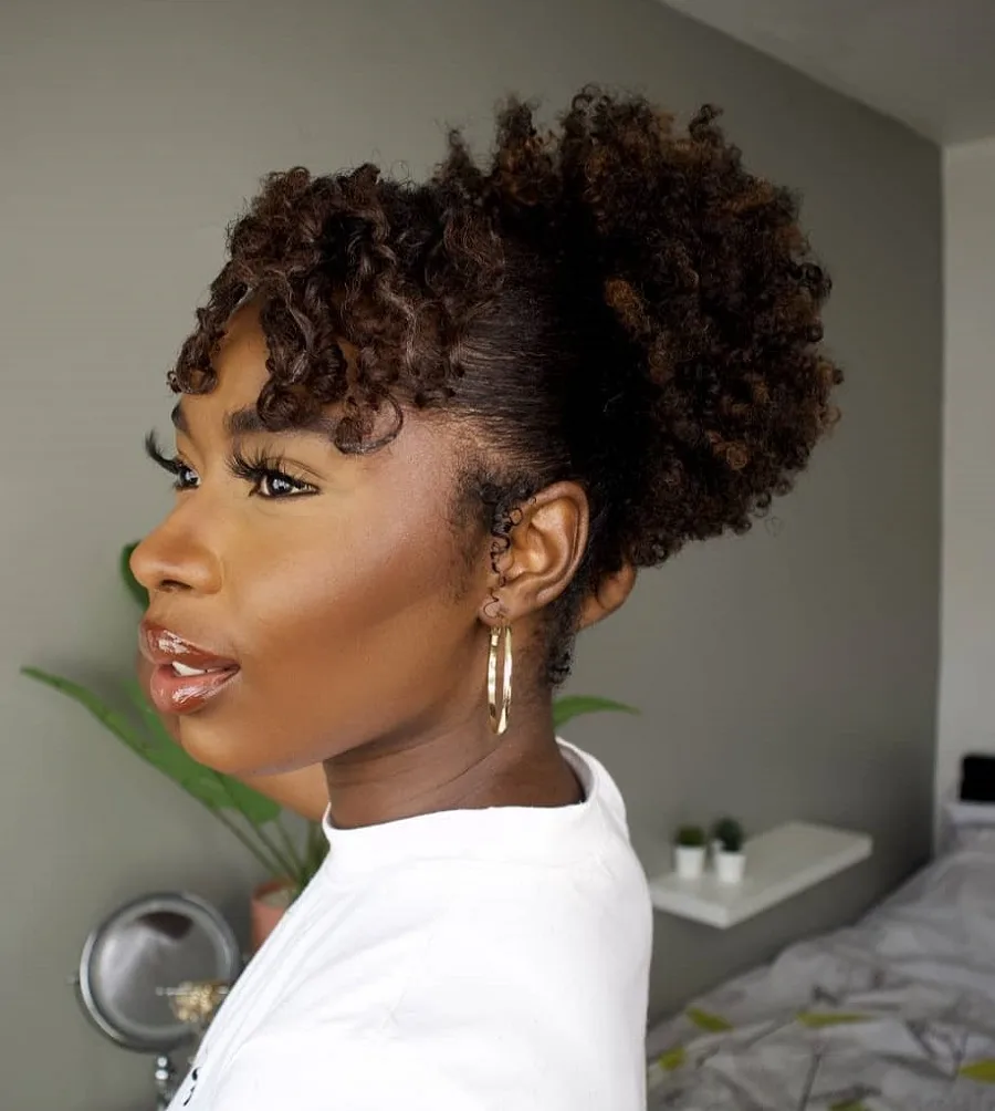 Afro puff hairstyle with bangs