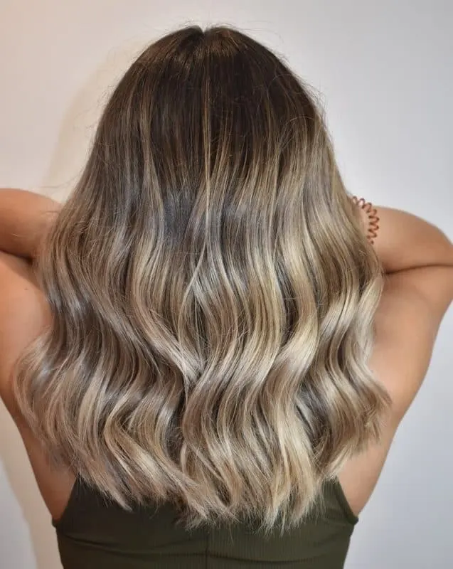 Ash blonde hair with shadowy roots
