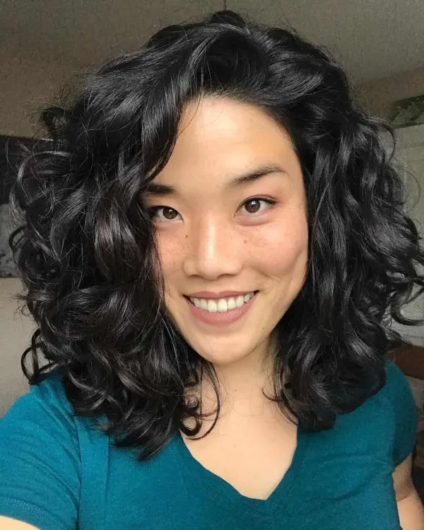 asian girl with thick curly hair