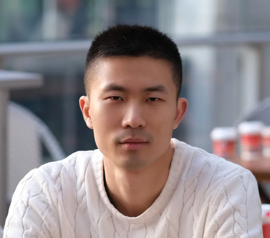 asian man with buzz cut