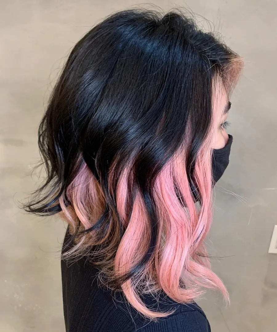 Asymmetrical black hair with pink underneath